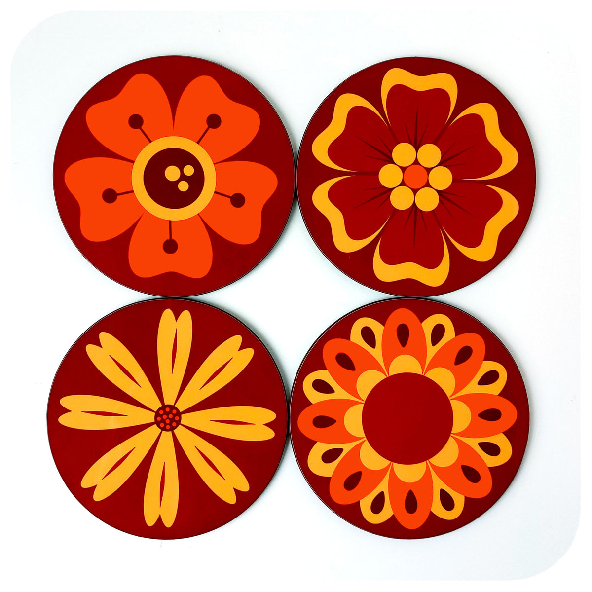 A set of four 70s style floral coasters on a white background | The Inkabilly Emporium