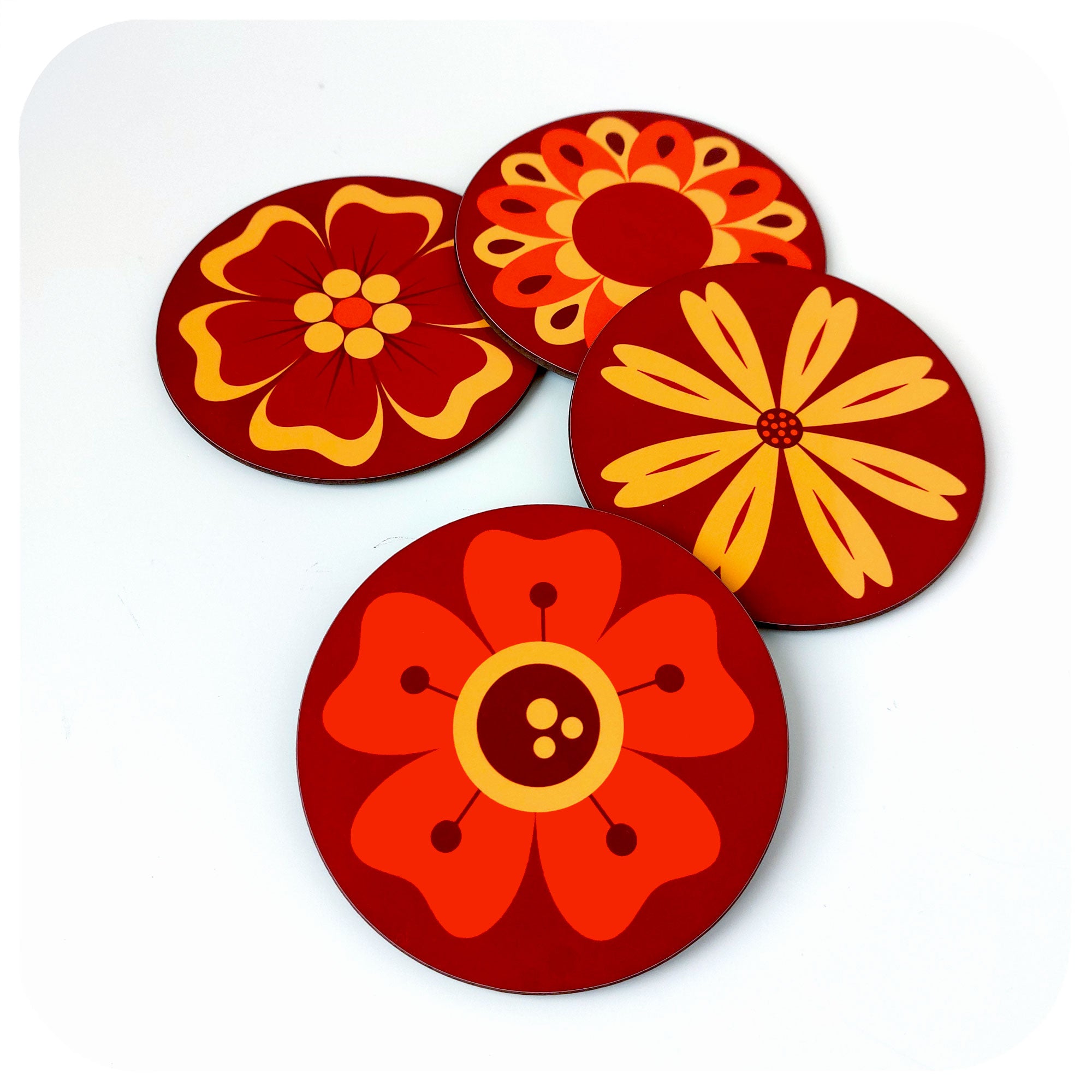 A set of four 70s style floral coasters on a white background | The Inkabilly Emporium