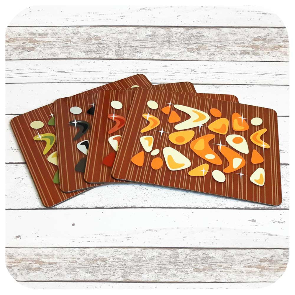 Atomic Boomerang Placemats on Teak  | The Inkabilly Emporium