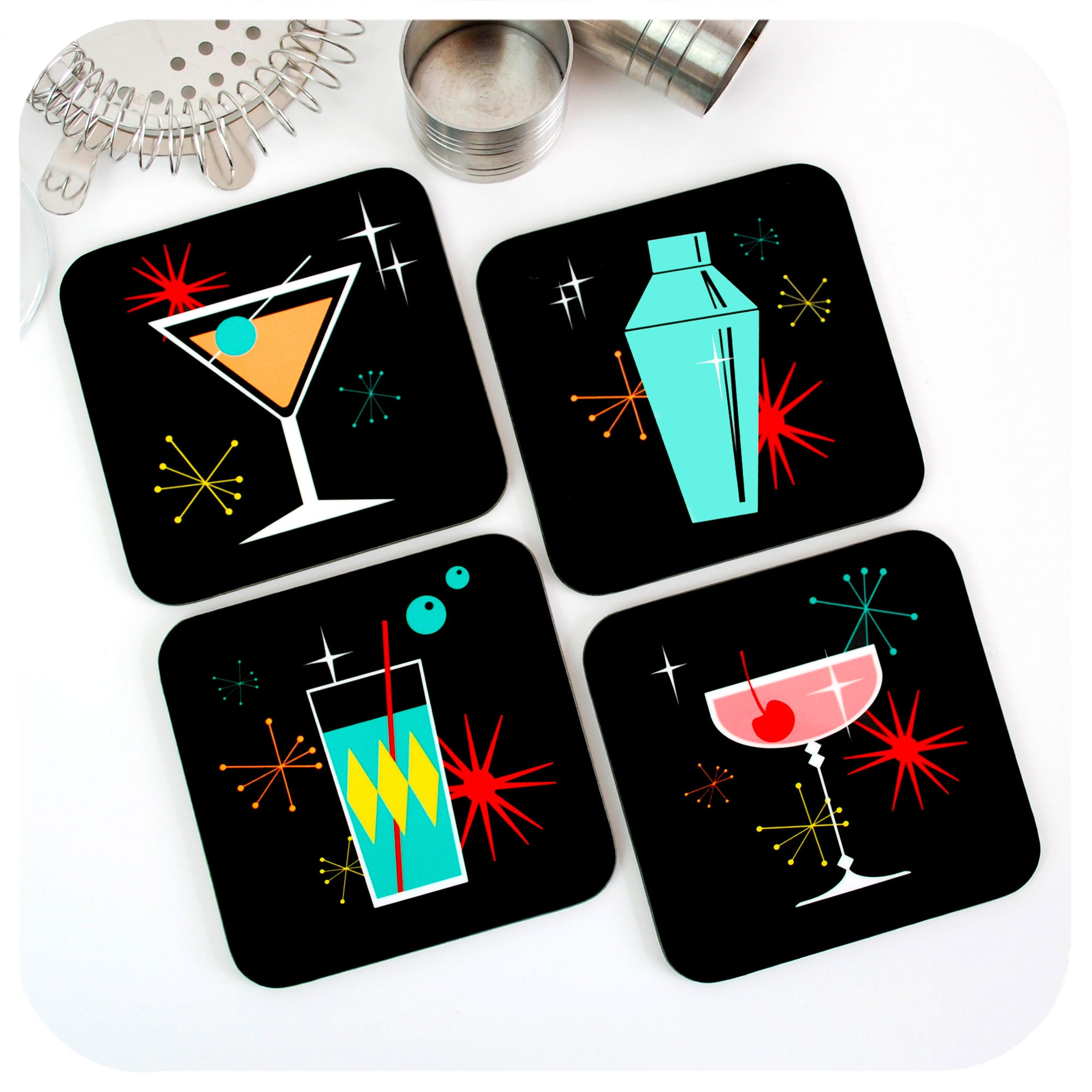 Cosmic Cocktail Coasters - Set of 4, on table with cocktail bar accessories | The Inkabilly Emporium