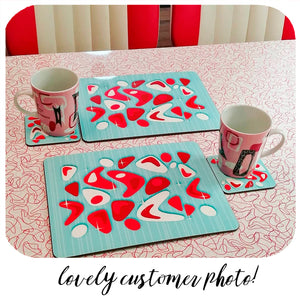 Lovely customer photo of our Turquoise and Red Atomic Boomerang placemats in their new home! | The Inkabilly Emporium