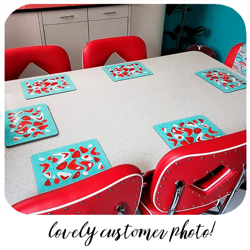 Lovely customer photo of our Atomic Boomerang (aqua & red) placemats in their new home! | The Inkabilly Emporium