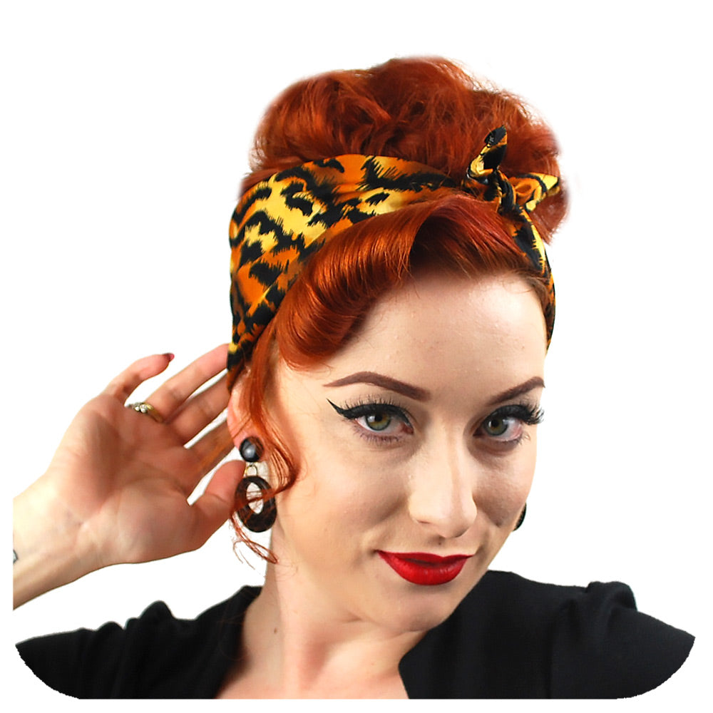 Tiger Print Bandana, modelled in a Rosie the Riveter Style | The Inkabilly Emporium