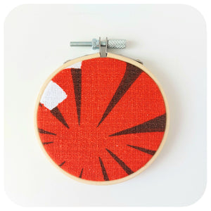 Vintage Fabric Embroidery Hoop on a white background