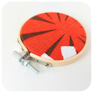 Vintage Fabric Embroidery Hoop on a white background