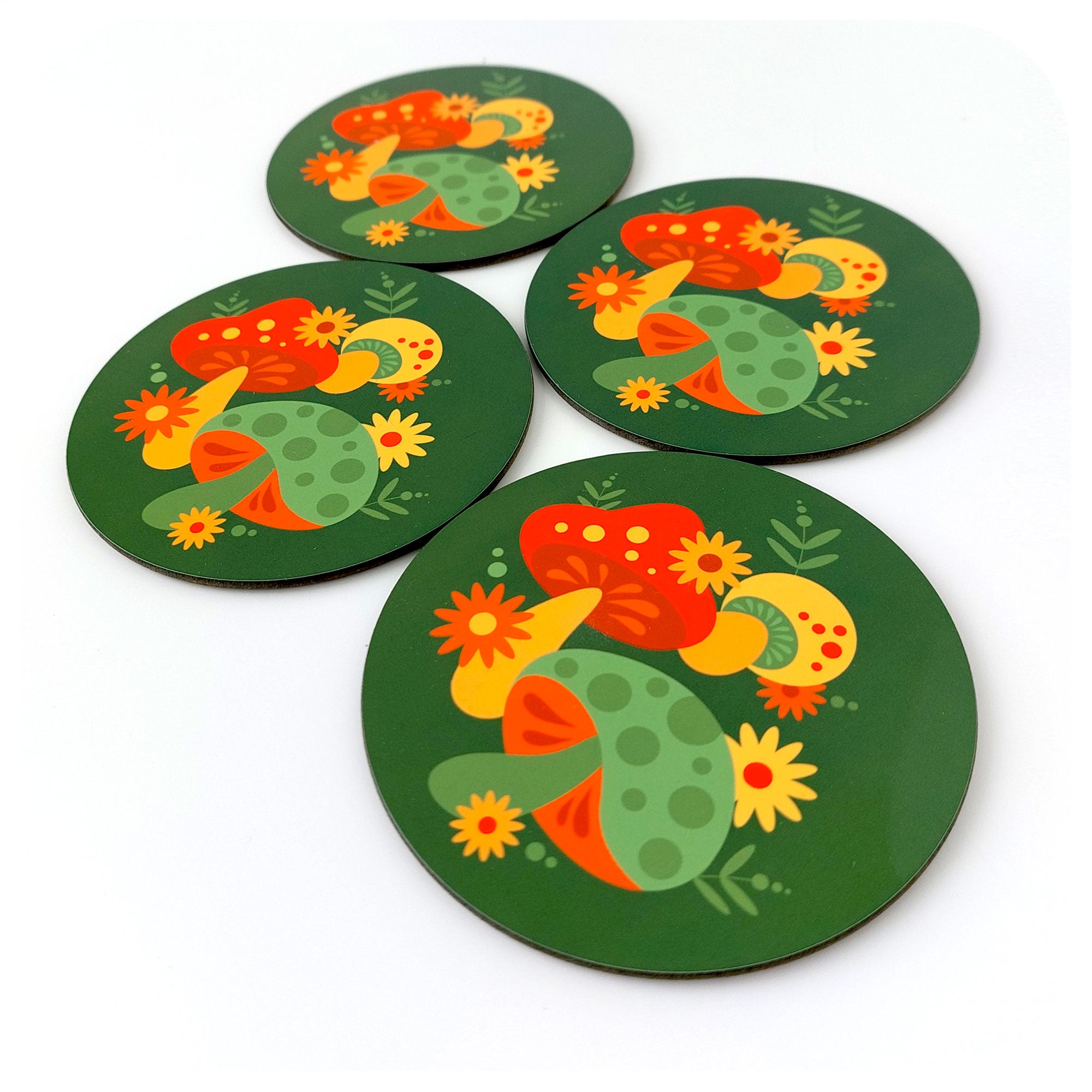 Set of 4 round retro coasters featuring 70s style mushrooms, on a white background | The Inkabilly Emporium