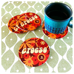Colourful 'Croeso' coasters with a vintage coffee mug on a retro patterned tablecloth | The Inkabilly Emporium