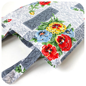Mid Centruy style floral-patterned tote bag on a white background