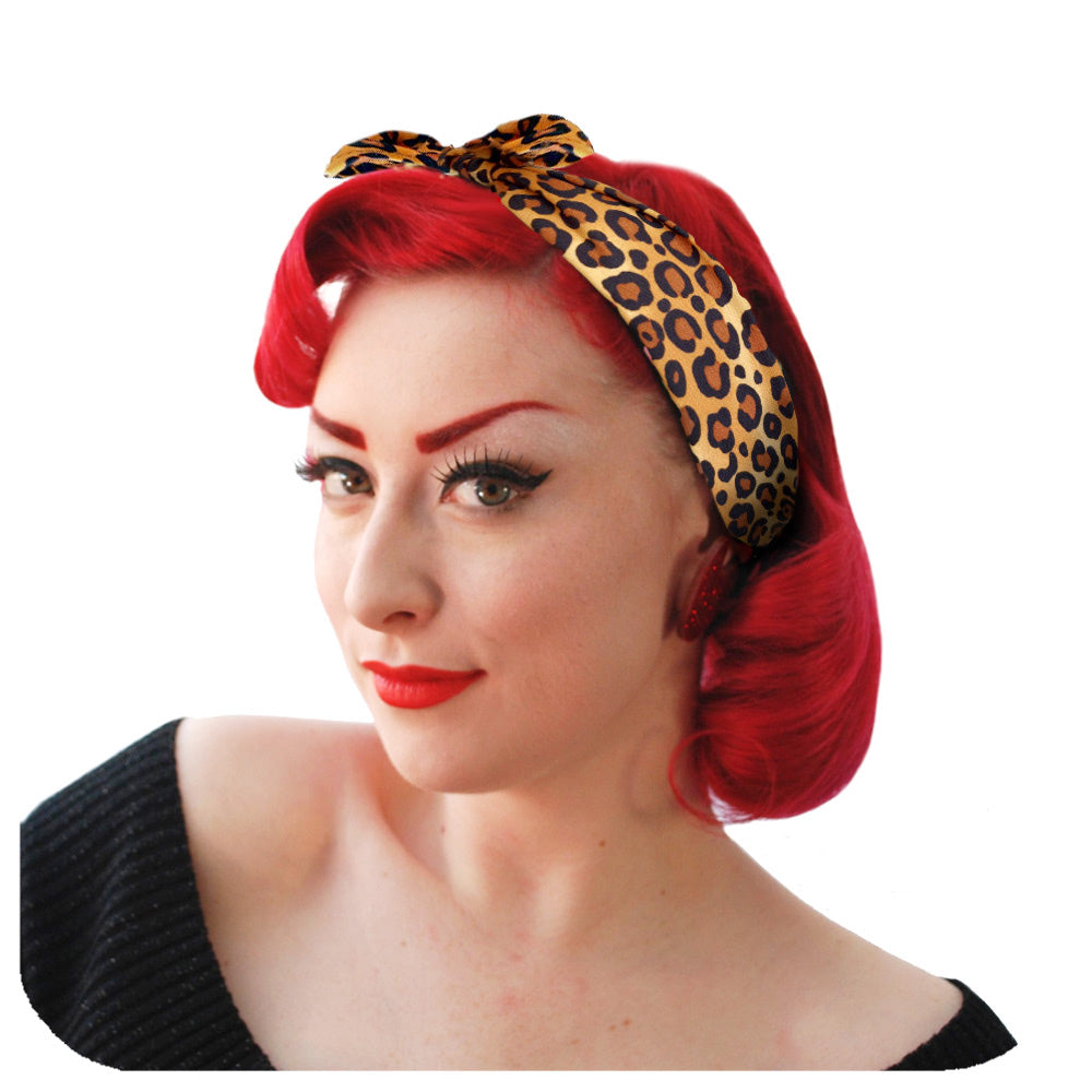 Leopard Print Bandana worn in an alice band style by a model with red hair | The Inkabilly Emporium