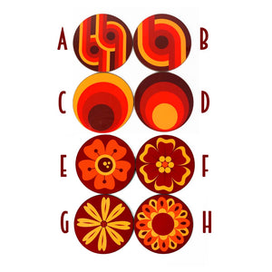 Eight circular designs in orange and red on a white background