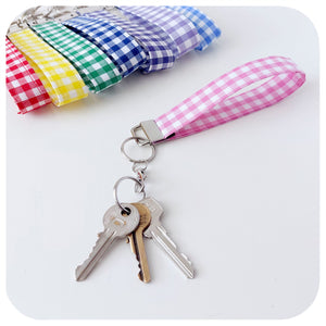 Pink Gingham Keychain with colourful checkered straps on a white background