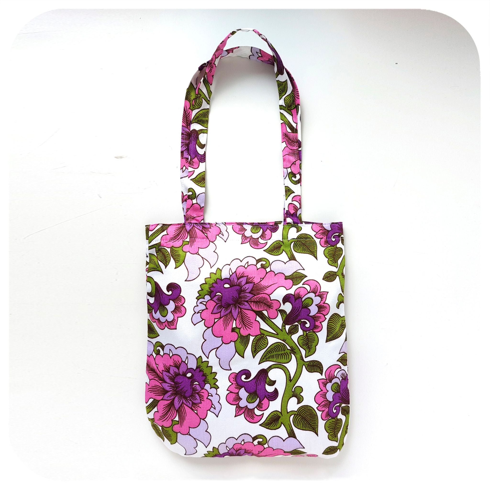 Floral patterned tote bag on a white background
