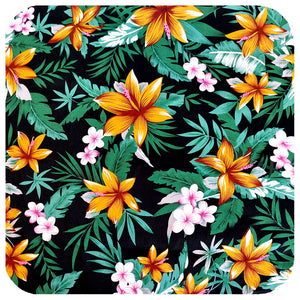 Close-up shot of Tropical Tiki Fabric used to make Inkabilly Bandanas, featuring orange/yellow hibiscus flowers, pale pink plumeria  and green palm leaves against a black background | The Inkabilly Emporium