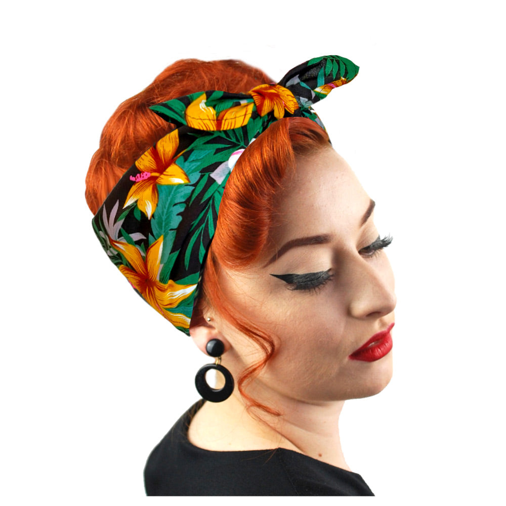 Tropical Tiki style bandana worn in a Rockabilly Bow style by a retro style model with pin up curls, looking over her shoulder | The Inkabilly Emporium