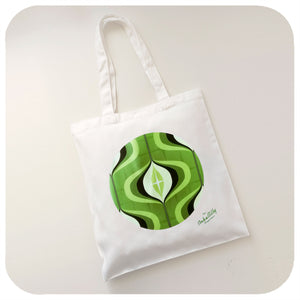 White Tote Bag featuring a green 70s style op art design on a white background | The Inkabilly Emporium