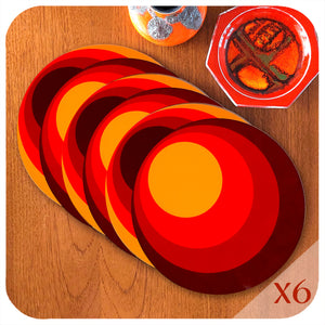A Set of 6 round 70s style placemats lie in an overlapping line on a teak table next to two vintage 70s pottery pieces, text in corner reads "X6" | The Inkabilly Emporium