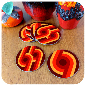 Set of six 70s supergraphic coasters on a teak table with fat lava vases| The Inkabilly Emporium