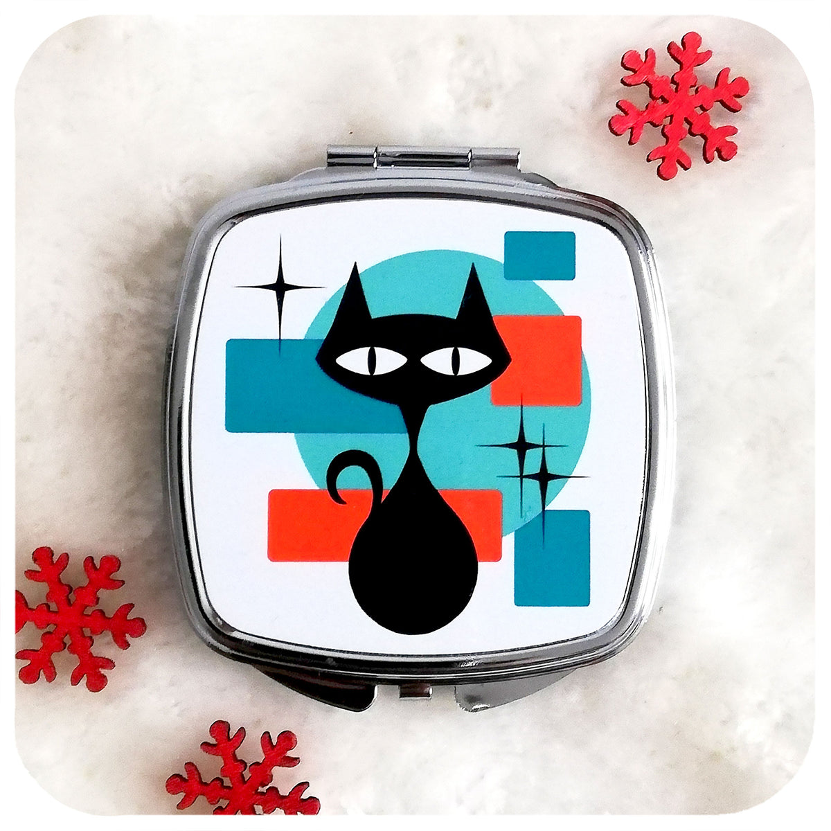 Atomic Cat 50s style Compact Mirror on white fur with Christmas stars | The Inkabilly Emporium