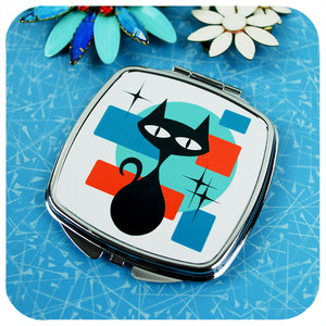 Atomic Cat 50s style Compact Mirror on retro table with vintage brooches | The Inkabilly Emporium