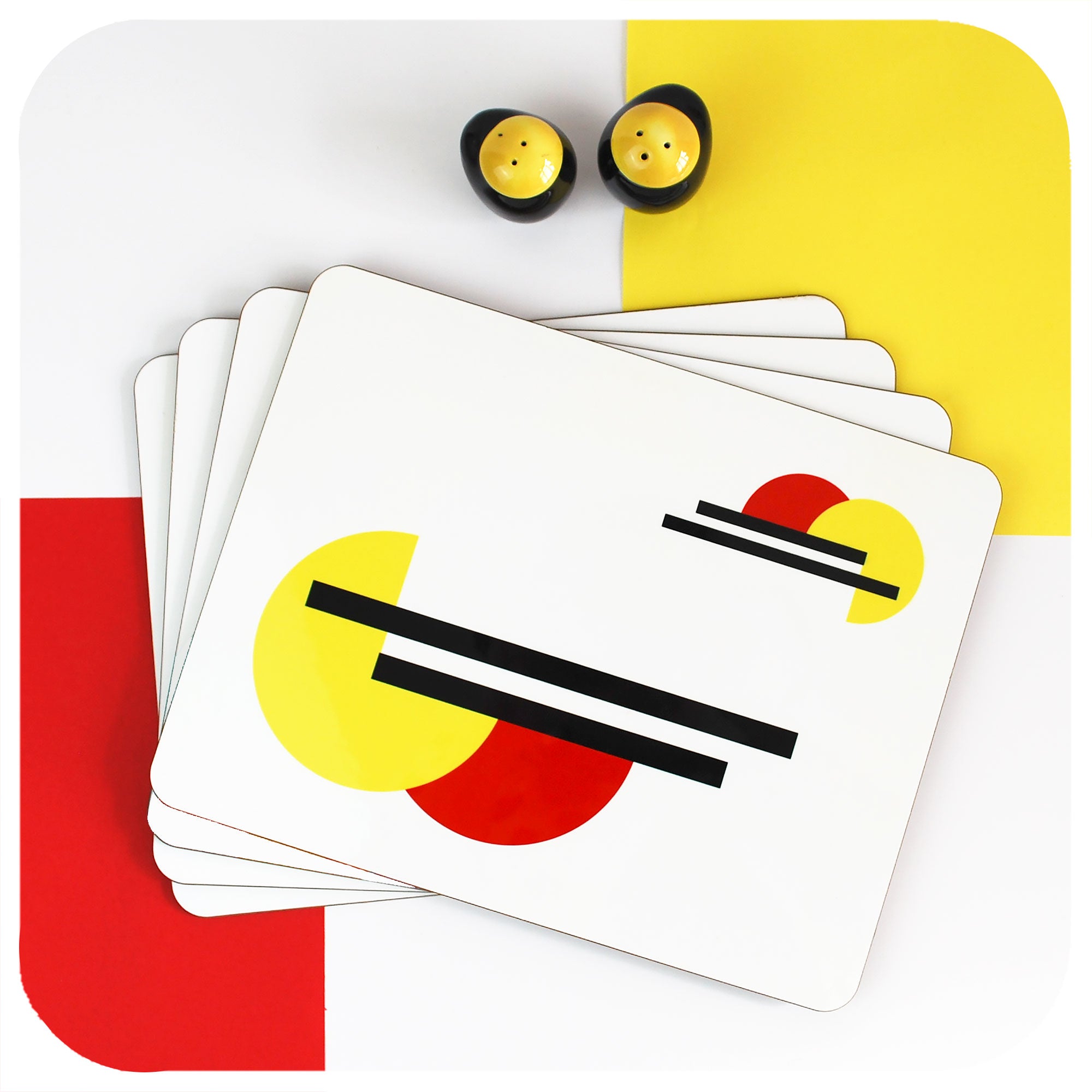 Bauhaus Placemats, set of 4 in a stack with vintage salt & pepper shakers | The Inkabilly Emporium