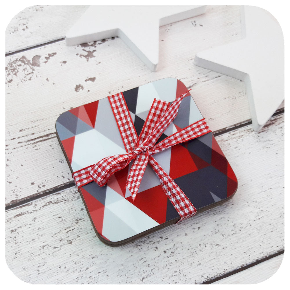 Scandi Coaster set in ruby reds and greys, wrapped in ribbon | The Inkabilly Emporium
