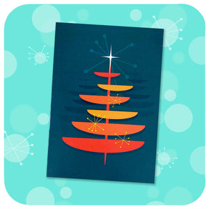 Retro Christmas Tree Card on blue graphic background with 50s style starbursts | The Inkabilly Emporium