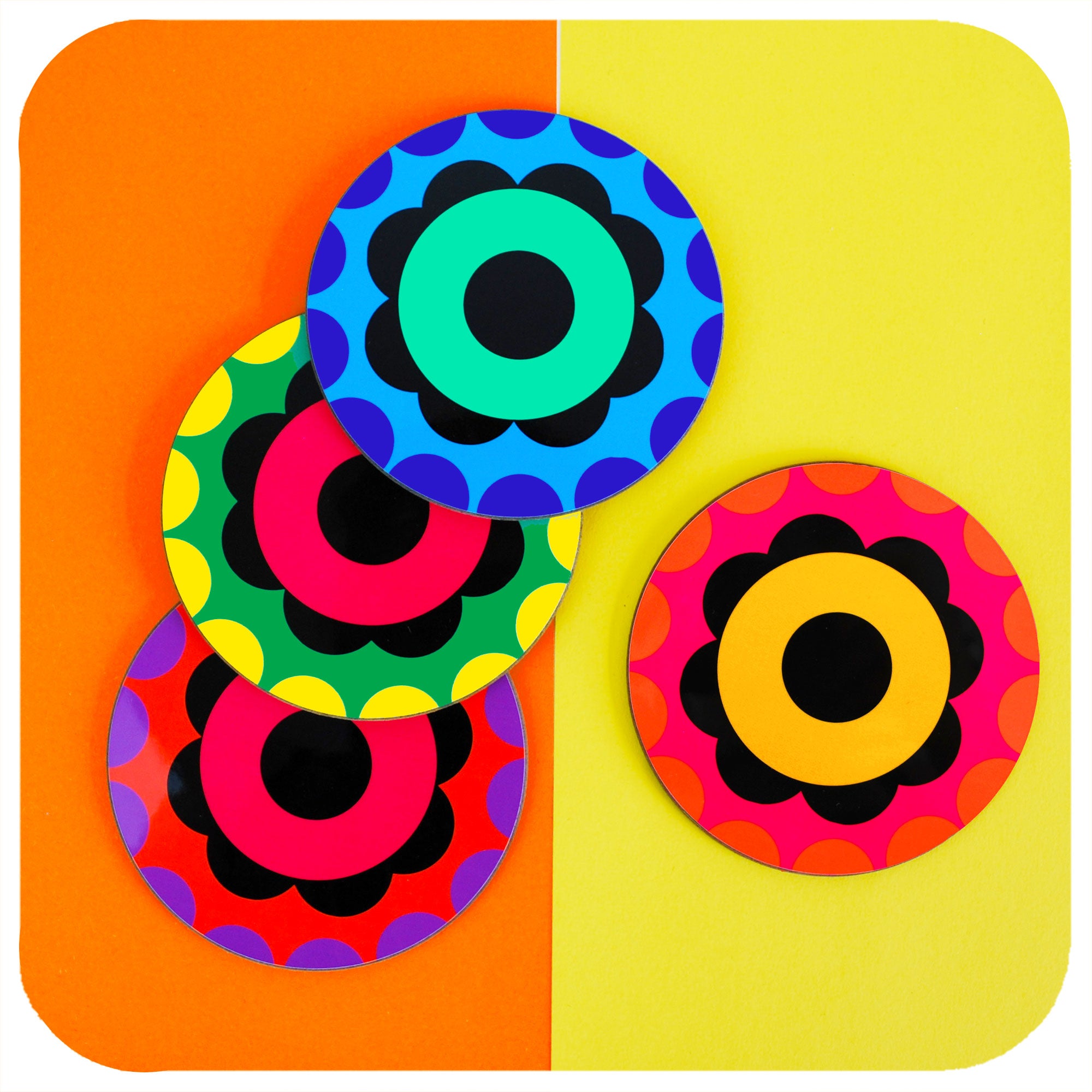Set of 4 Colourful 60s Flower Power style coasters scattered on a colourblock background | The Inkabilly Emporium