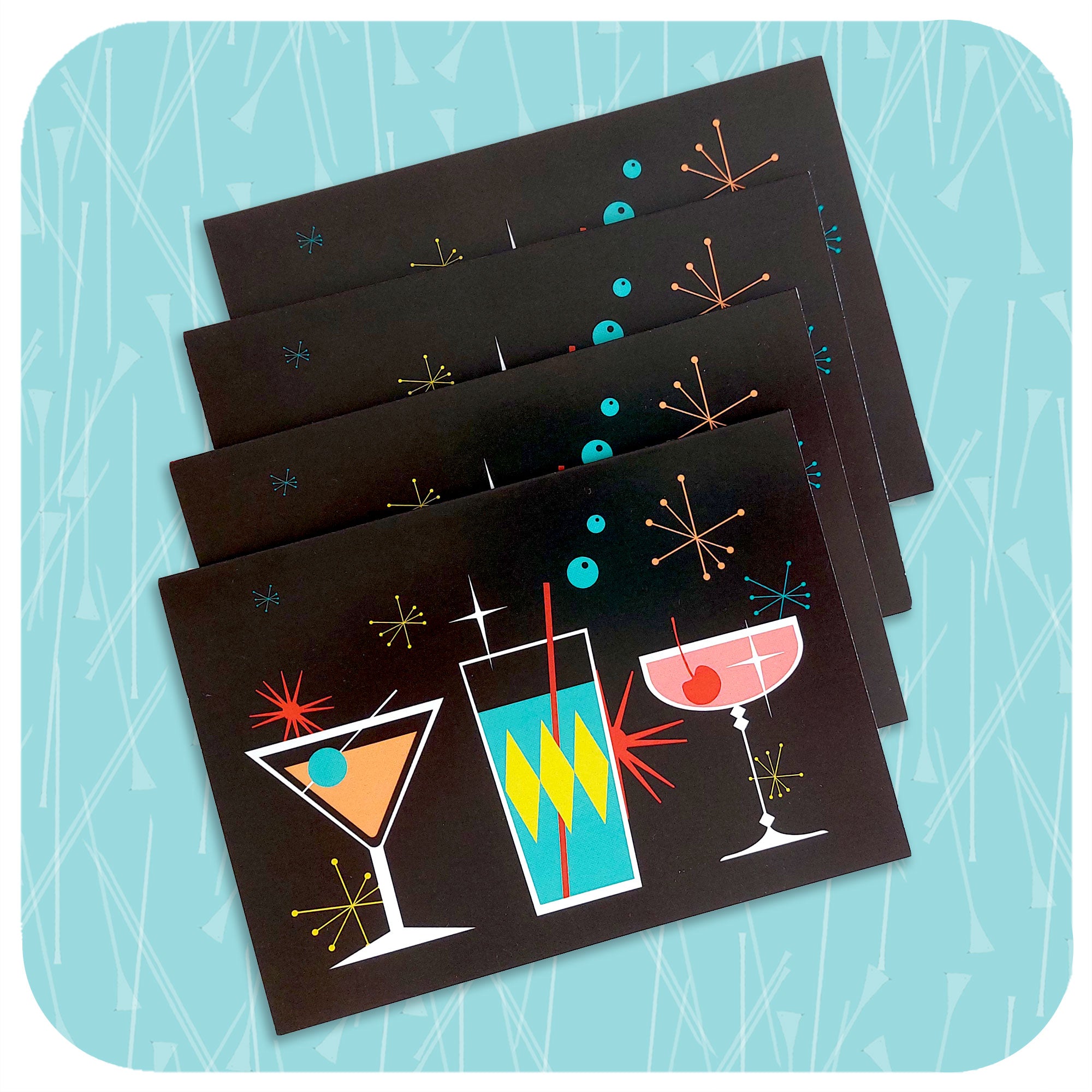 Four Cosmic Cocktails  Greetings Cards, on a turquoise background | The Inkabilly Emporium