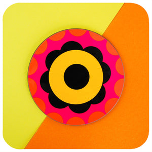 One 60s Flower Power round coaster on a yellow and orange background | The Inkabilly Emporium