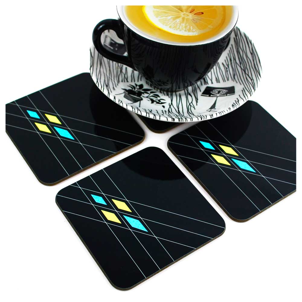 Art Deco style Mid Century Geometric Coasters in Black, on a white background with vintage Homemaker tea cup and saucer | The Inkabilly Emporium