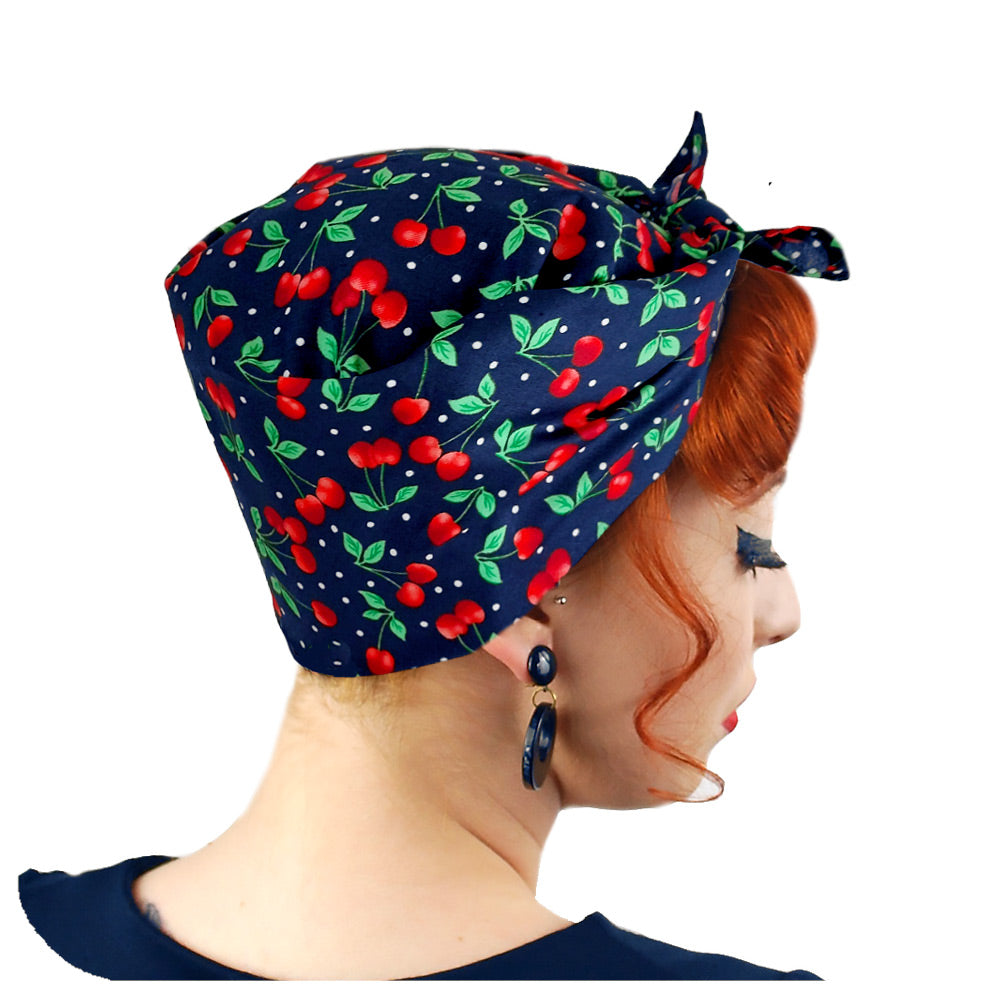 Navy Cherries Bandana worn in a Rosie the Riveter style | The Inkabilly Emporium