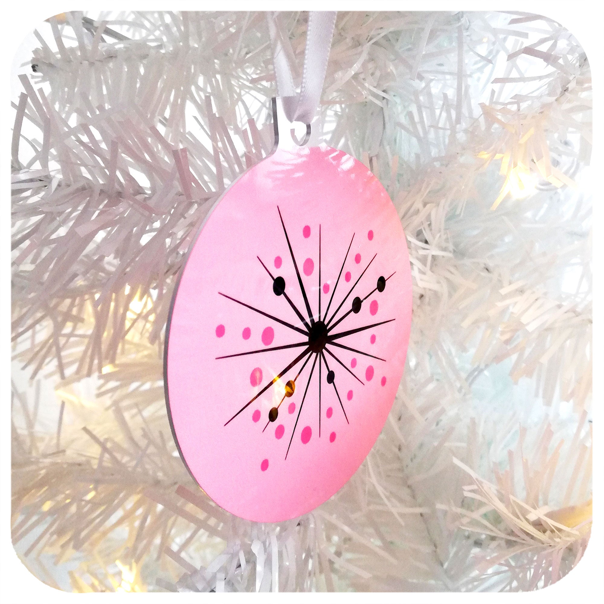 Pink Atomic Starburst Christmas Decoration hanging on white Christmas Tree| The Inkabilly Emporium