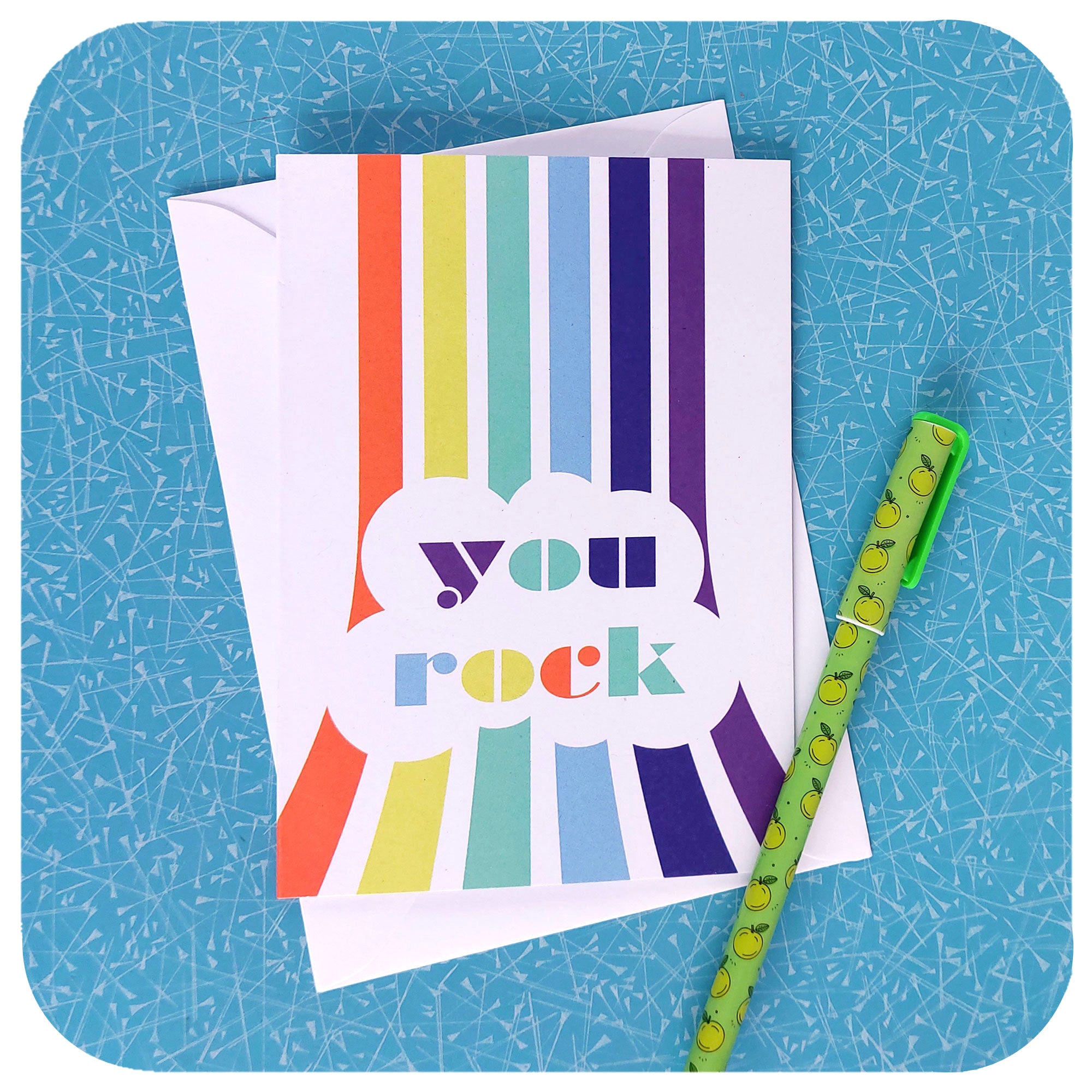 "You Rock" Greetings Card on blue table with white envelope and green pen | The Inkabilly Emporium