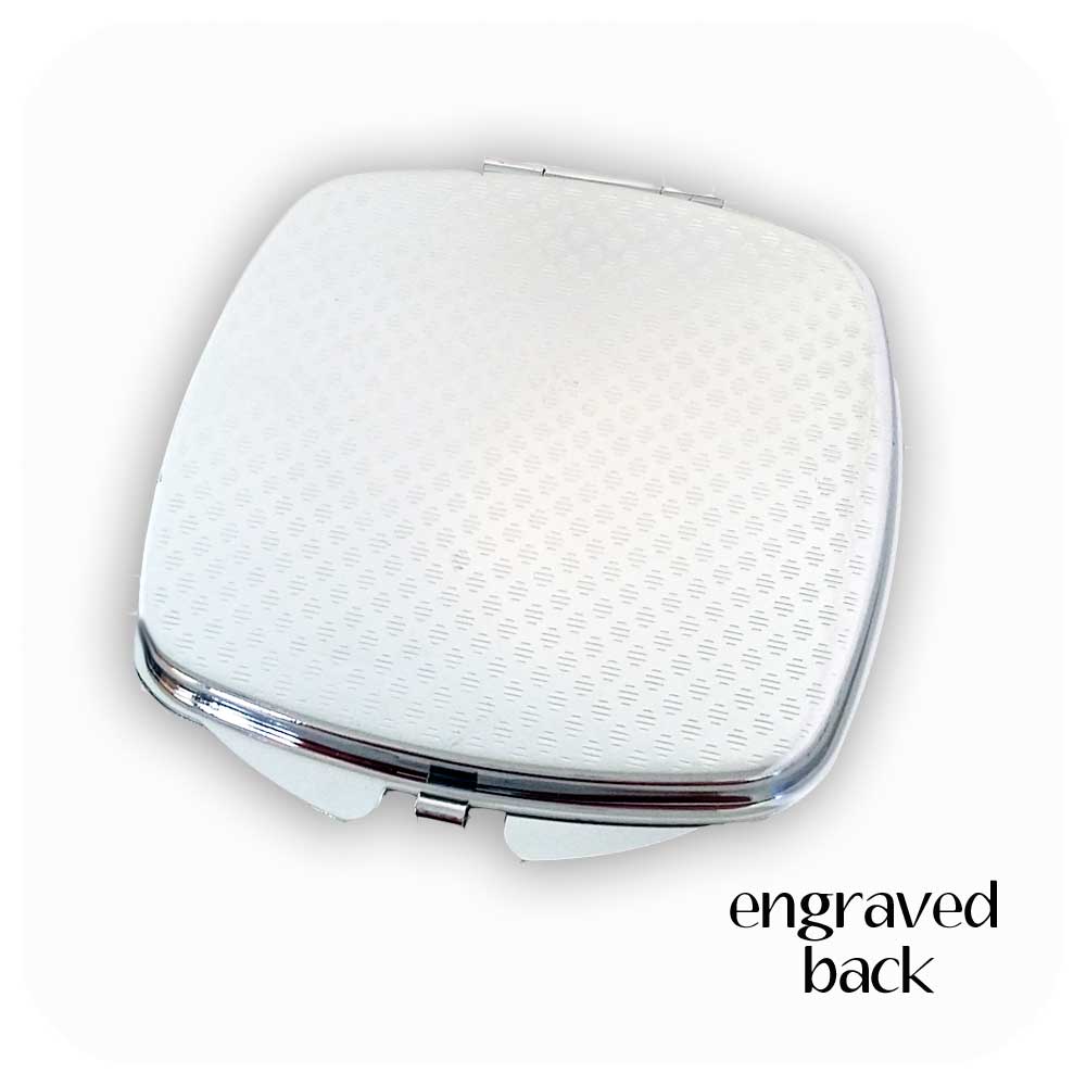 Compact mirror, showing detail of engraved back | The Inkabilly Emporium